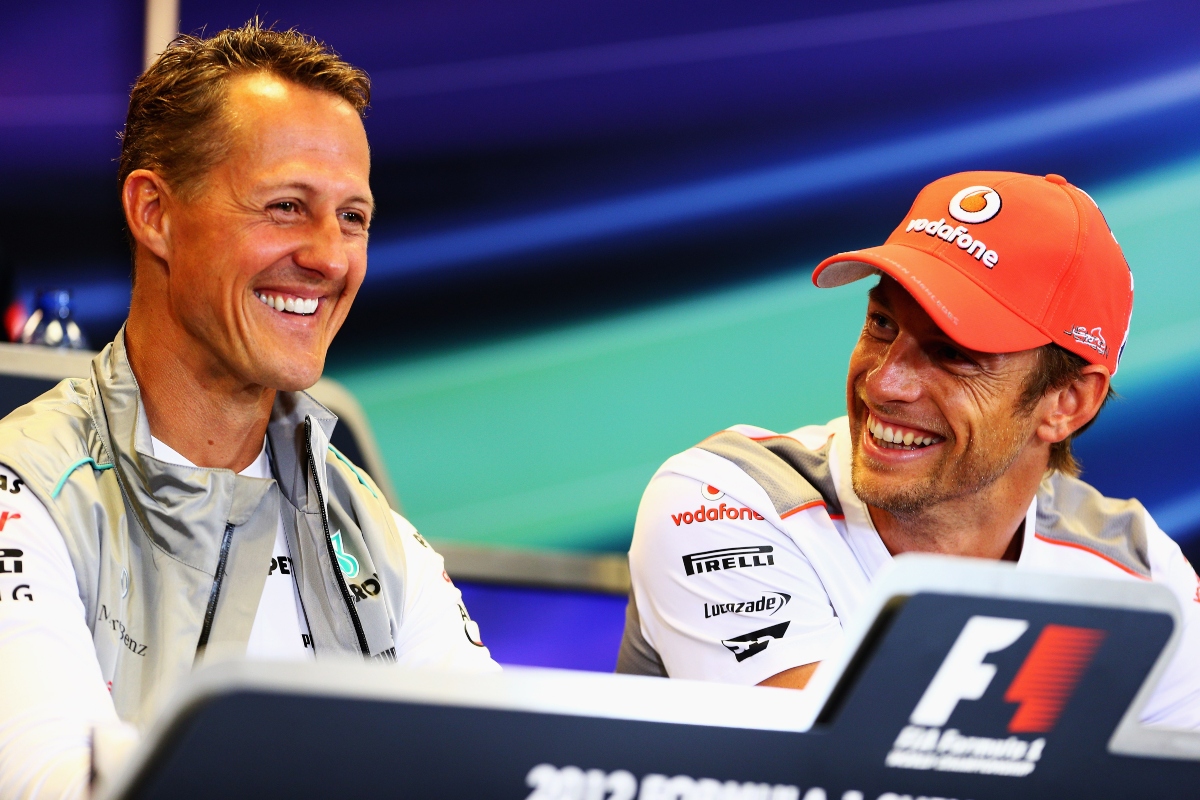 Michael Schumacher e Jenson Button (Getty Images)