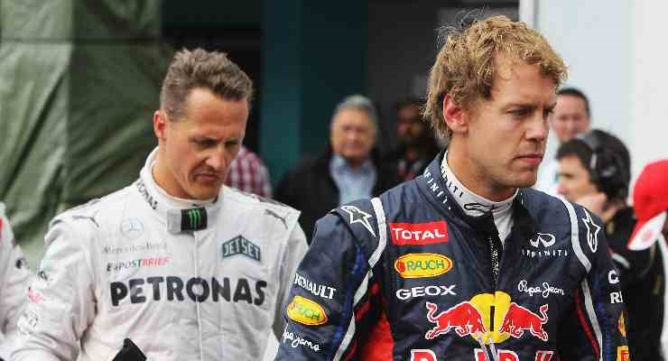 Seb con Michael Schumacher (foto di Ker Robertson/Getty Images)