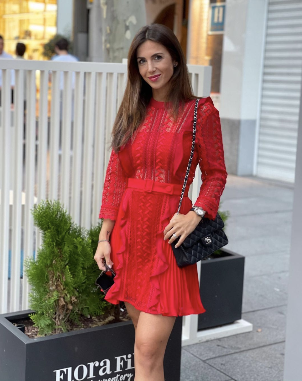 Laura Montero in a red dress